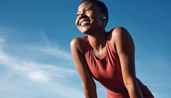 Lady smiles outdoors