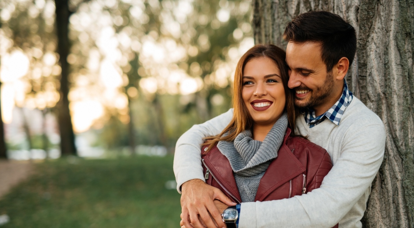 Man and woman with flawless smiles after cosmetic dentistry