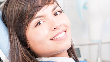 Close-up of woman smiling in dental chair