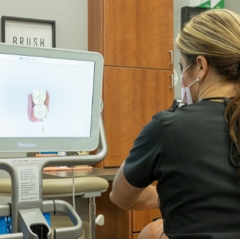 Dentist using digital bite impression system