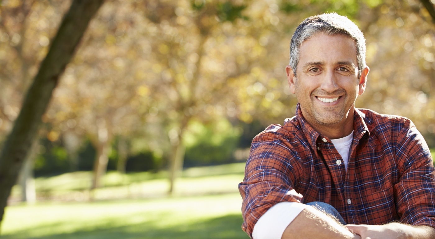 Man with healthy smile after restorative dentistry