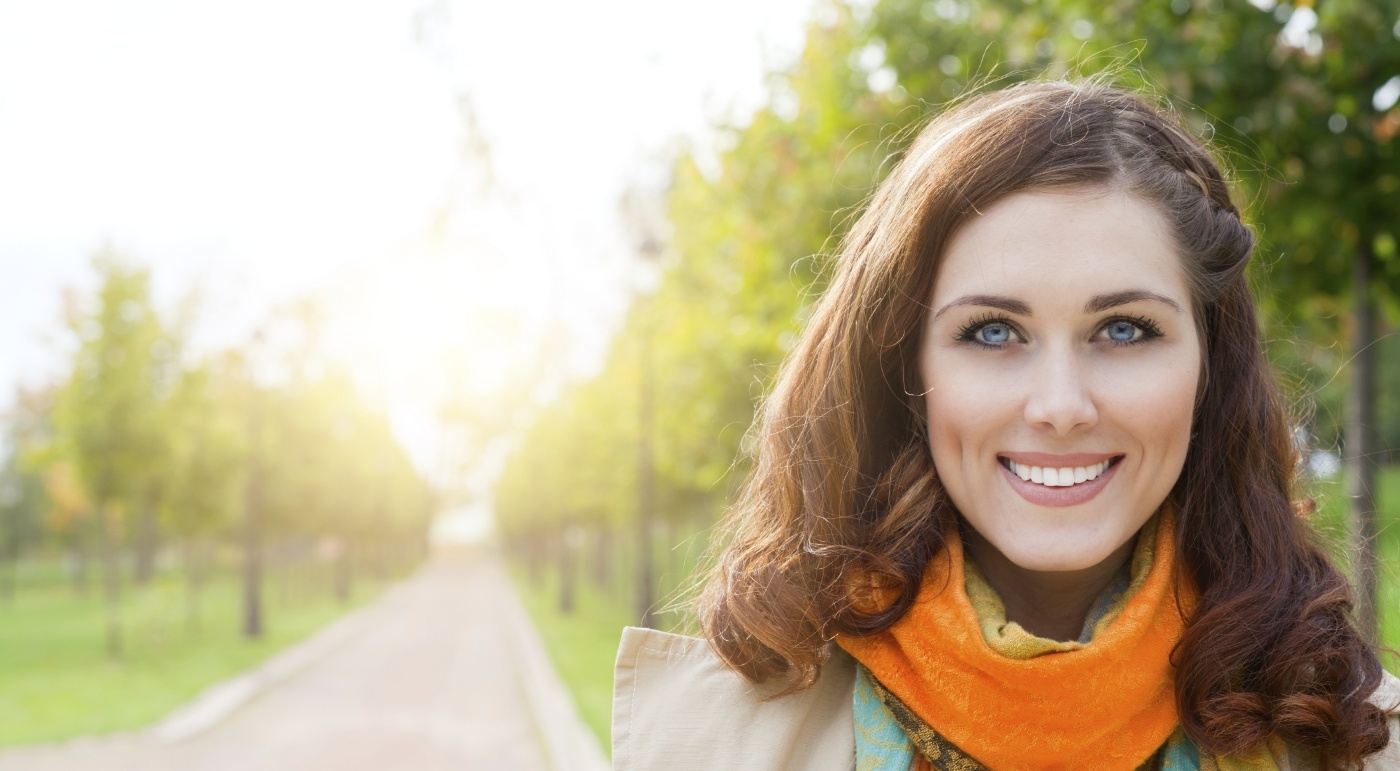 Woman with flawless smile after dental services in Tulsa Oklahoma